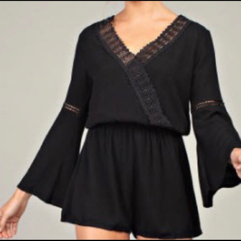 Plus size black long sleeve romper